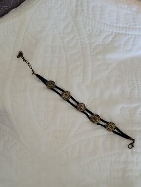 Vintage-Inspired Black Cord Bracelet with Brass Medallions